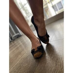 Salvatore Ferragamo Black and Tan Flats